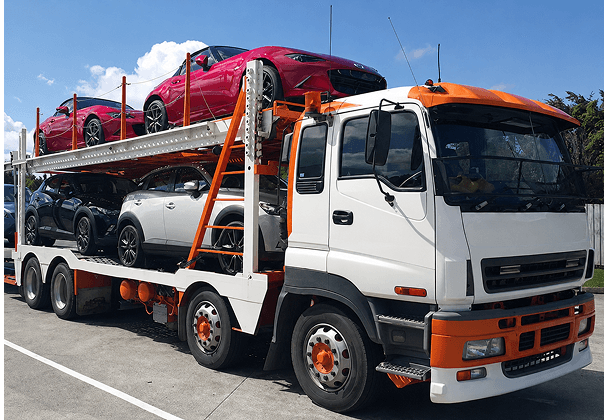 Car transporter truck for vehicle imports paid via Raiz Finance
